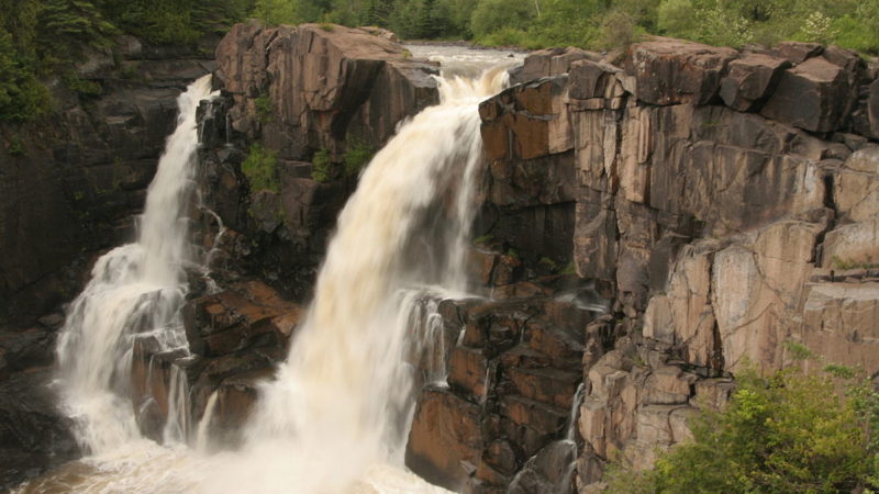 "Pigeon River High Falls, on the Minnesoda - Ontario border -a" by Sharon Mollerus - originally posted to Flickr as Pigeon River High FallsUploaded using F2ComButton. Licensed under CC BY 2.0 via Wikimedia Commons.