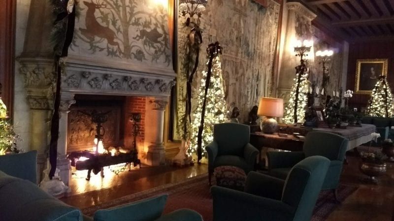 One of the main halls in Biltmore House, with three fireplaces and priceless tapestries lining the walls.